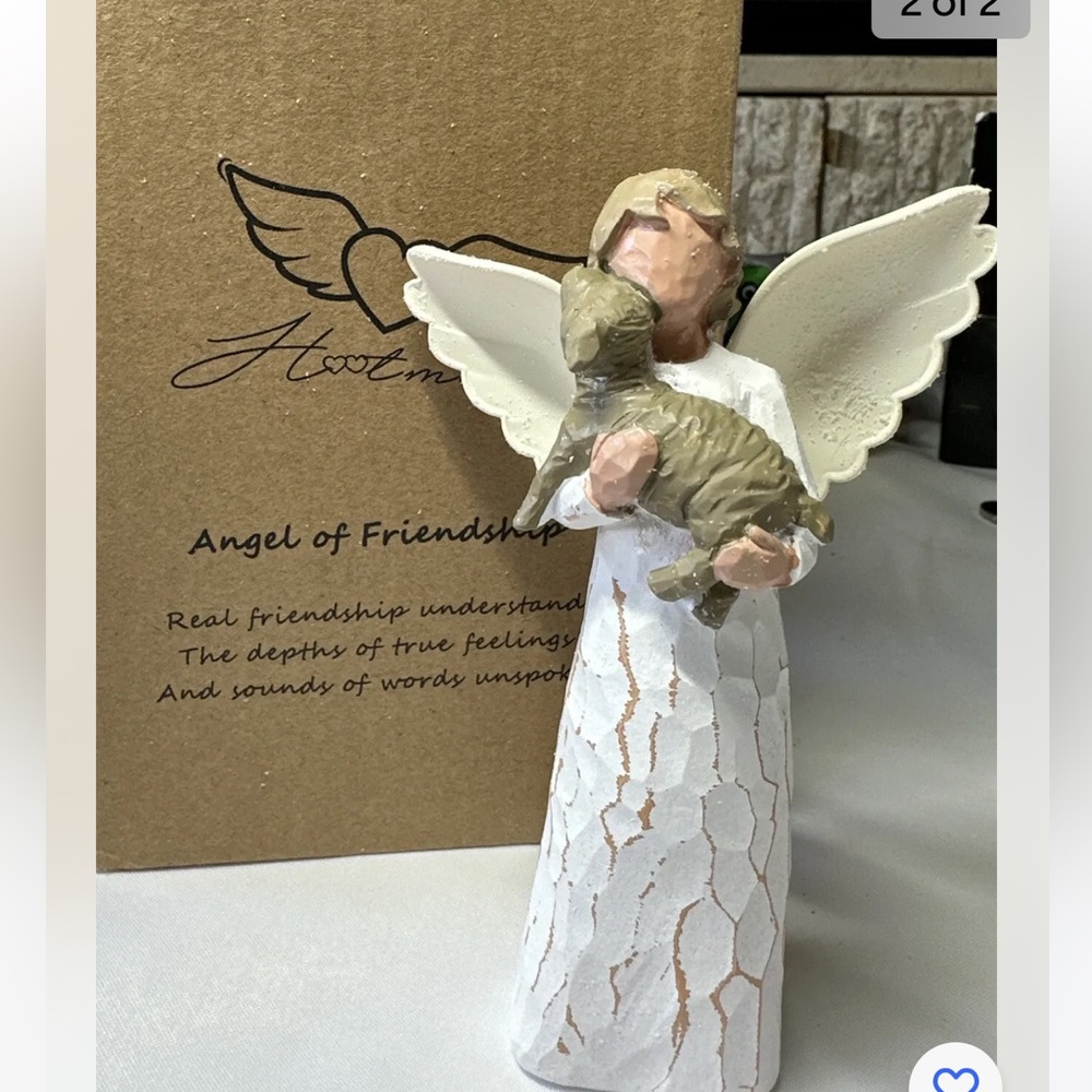 Hand painted resin pet figure. New in box
